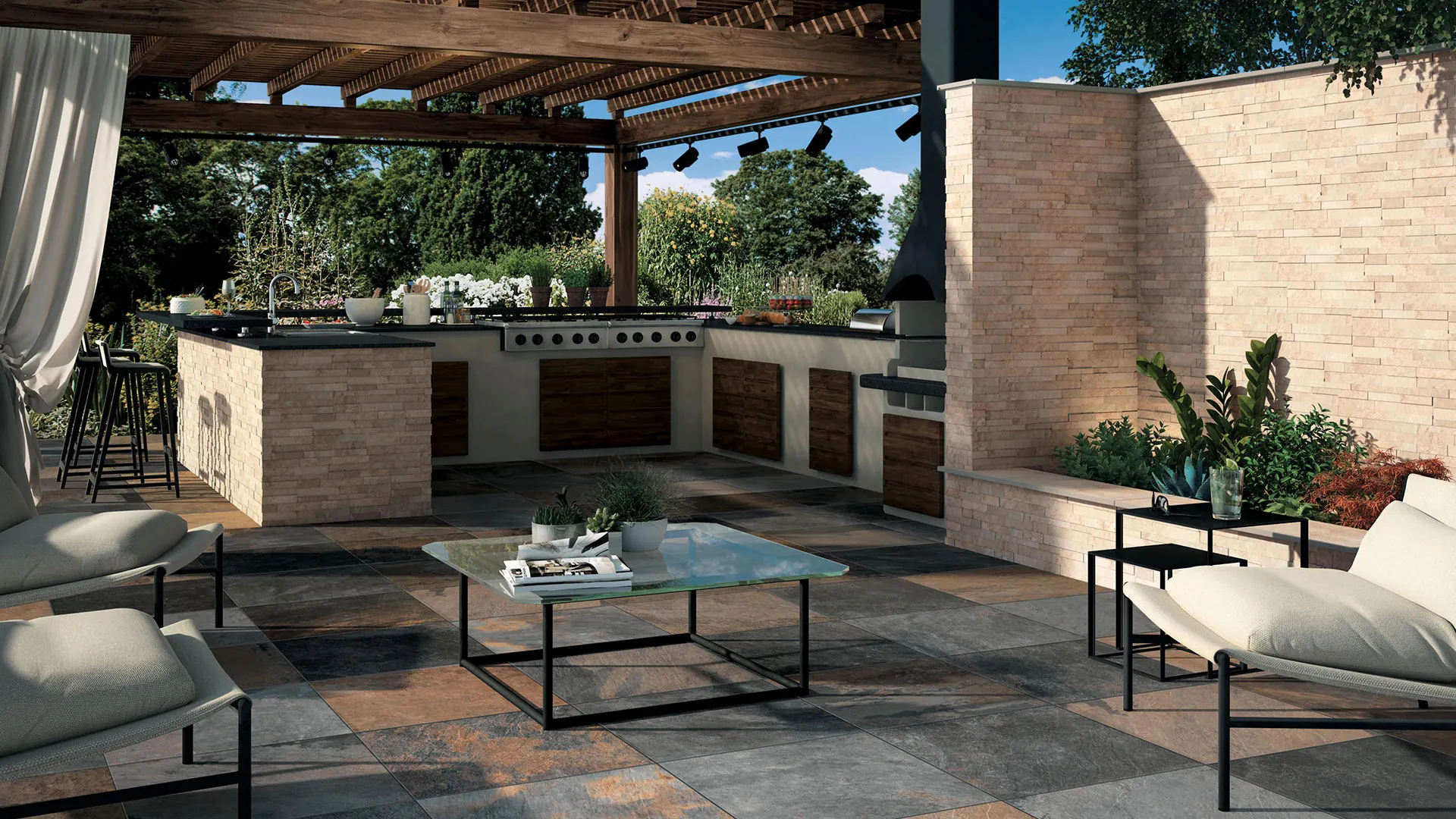 Ambiente esterno con cucina, pavimento in gres e rivestimento in pietra